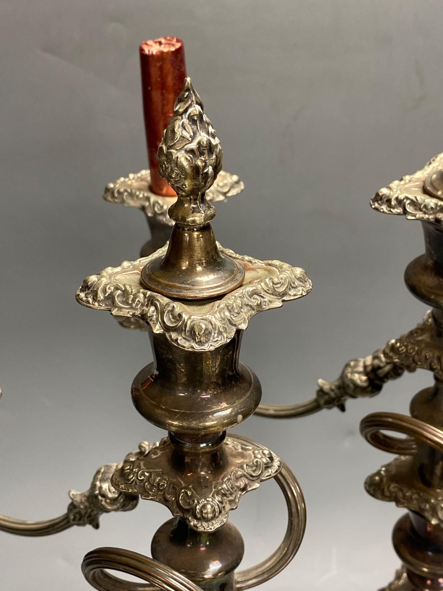 A pair of silver plated candelabra, three sconce candelabra, 51cm